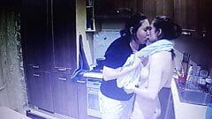 Two young lesbian girls kiss and have sex together