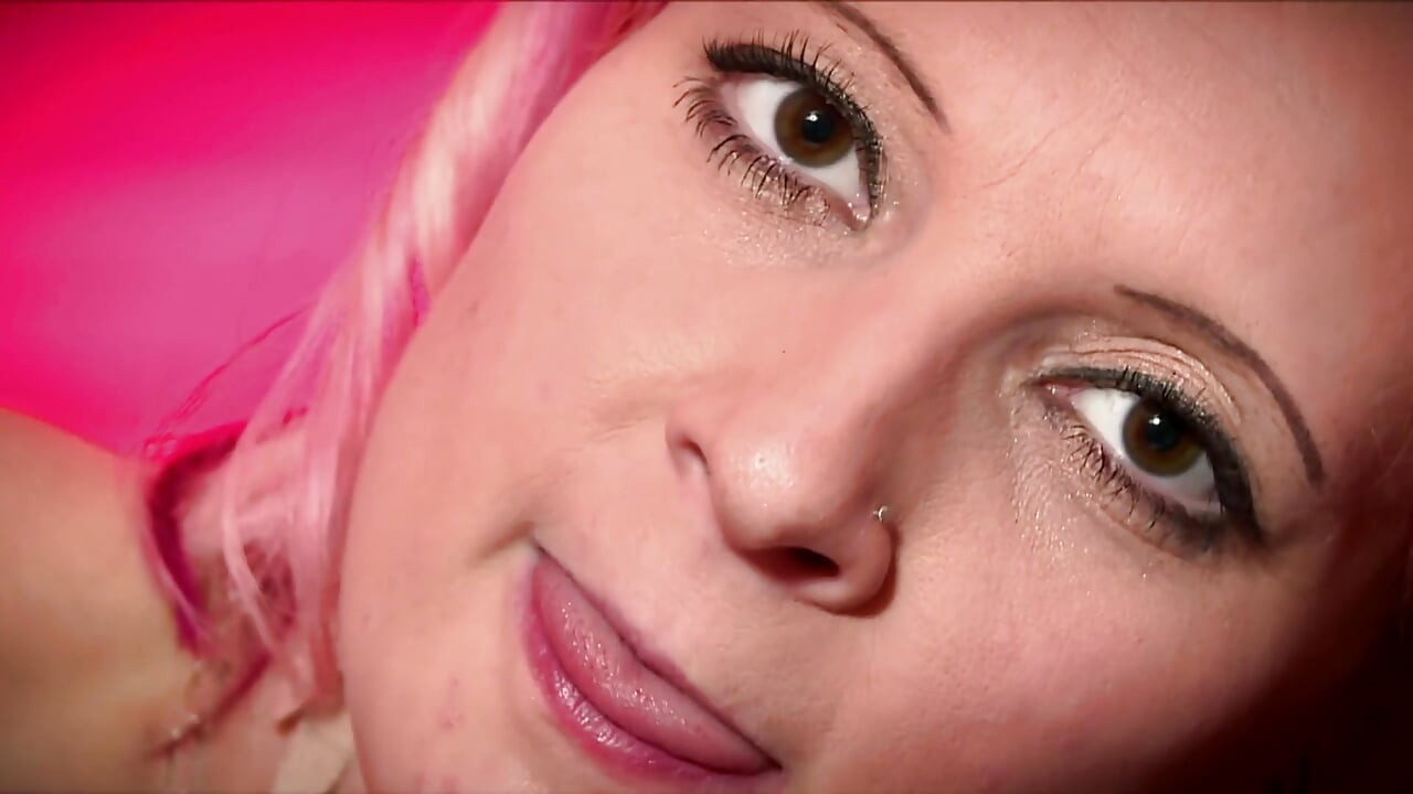 Colored hair chick plays with his white cock