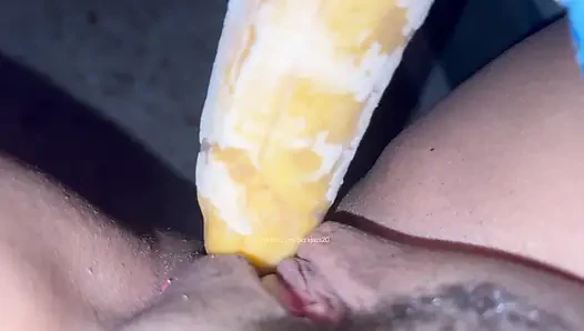 Trying for the first time young girl with cucumber