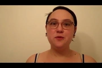 girl rubs her breasts