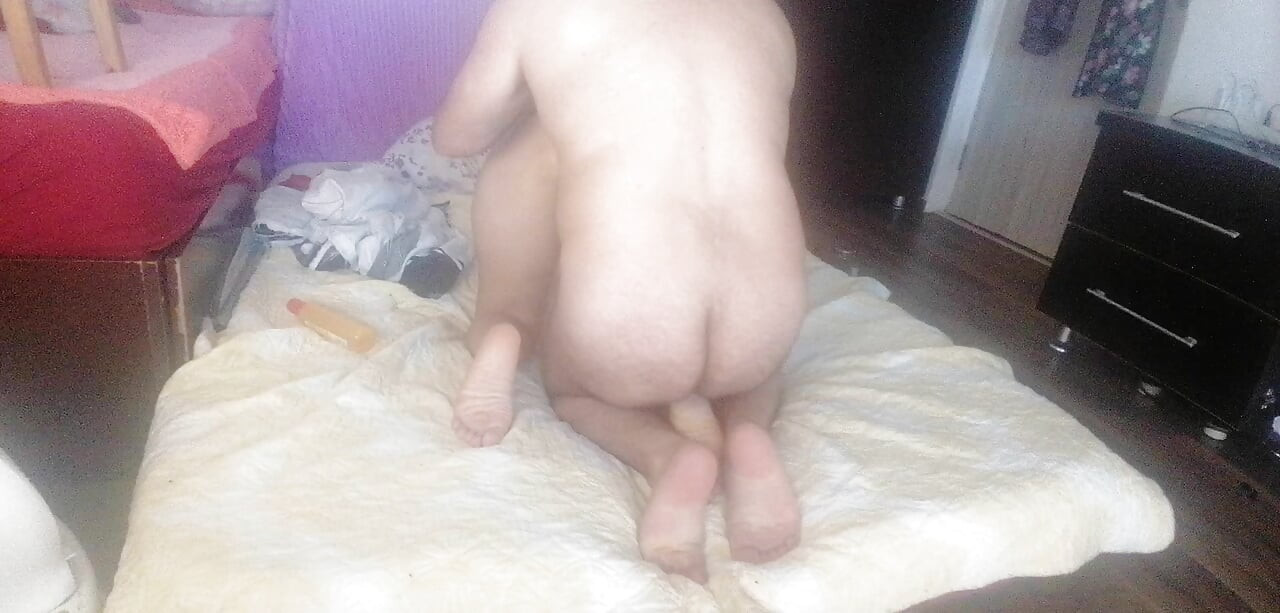 Sensual massage of a hot couple with oil on the body.