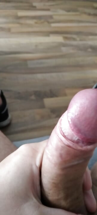 Horny young man massages his cock and cums lustfully