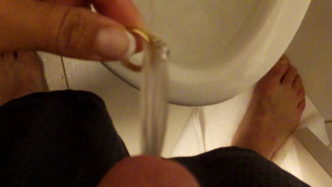 peeing on her wedding ring