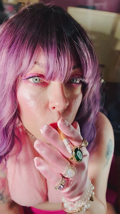 A Cute Tina Snua Tip To Tails 2 Cigarettes With Lots Of Smoke Rings In Satin Gloves & Jewellery