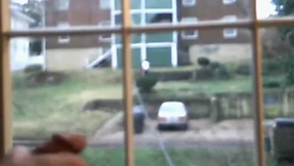 Naked for the neighbors at the window