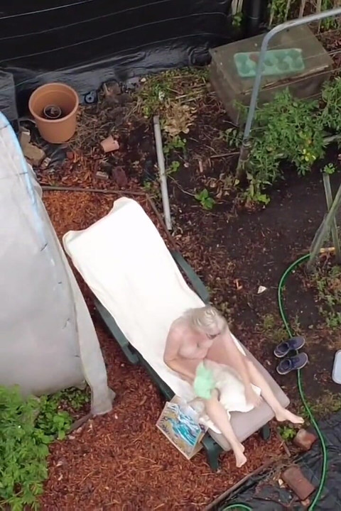 Voyeur with Drone Watches Me in the Garden Playing with Myself