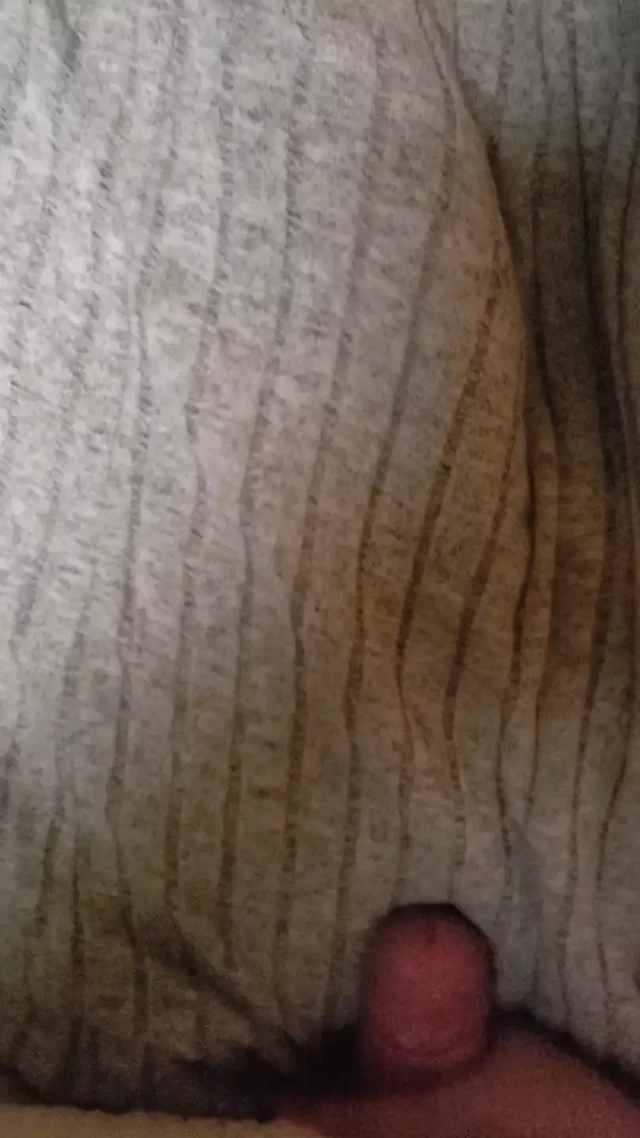 Cumming on a soft cardigan