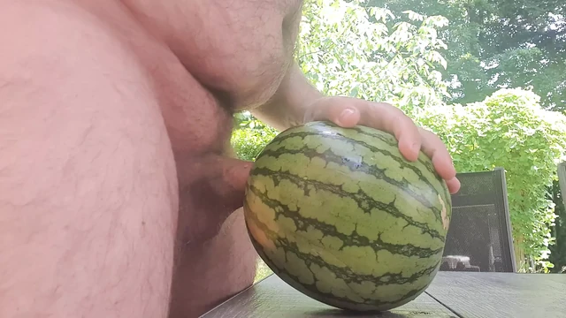 Horny nudist fuck melon at home in the garden