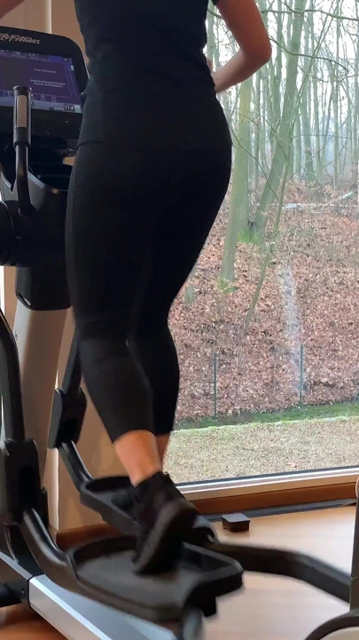 Business woman trains in gym to stay fit