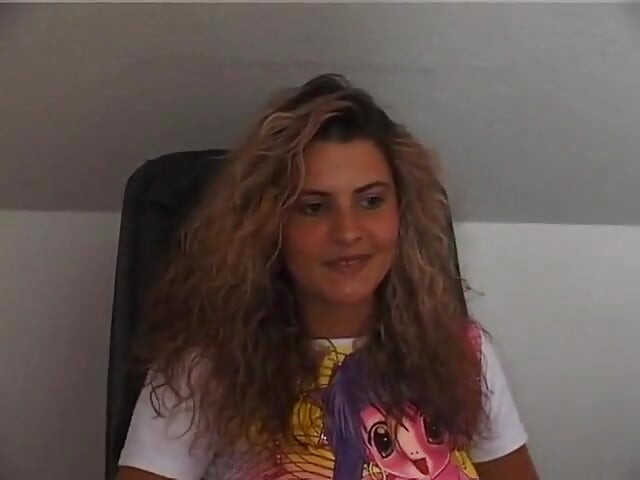 Gorgeous curly haired babe masturbating in solo video
