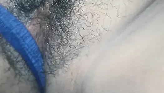 Chubby wife shows her buttocks on the bed