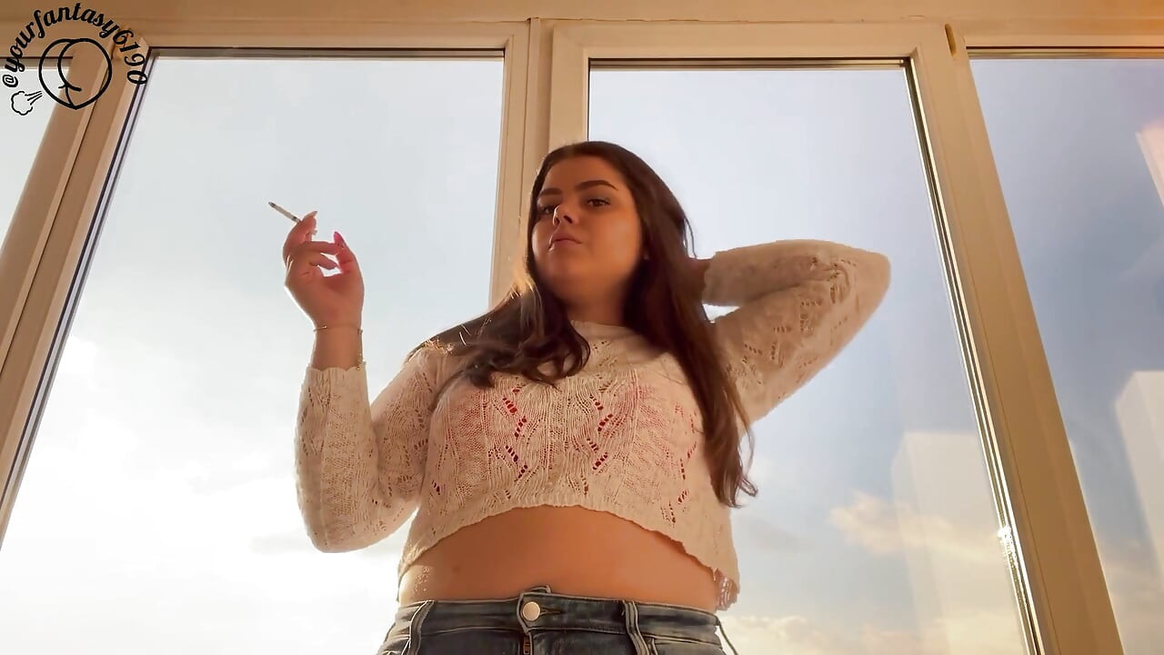 Latina Smoking at Sunset