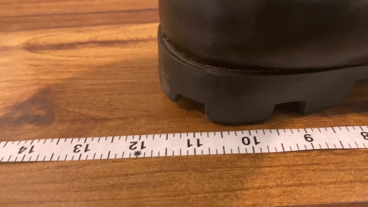 Crushing Toy Truck in Combat Boots (close-up)