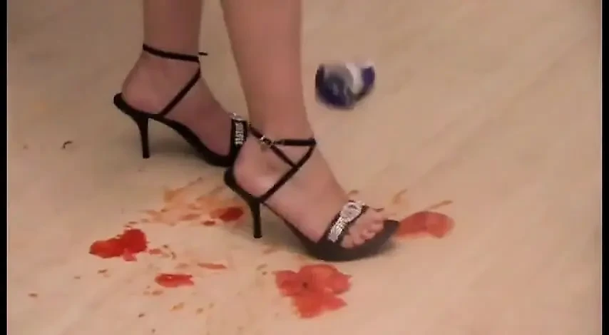 Crushing cake with high heels