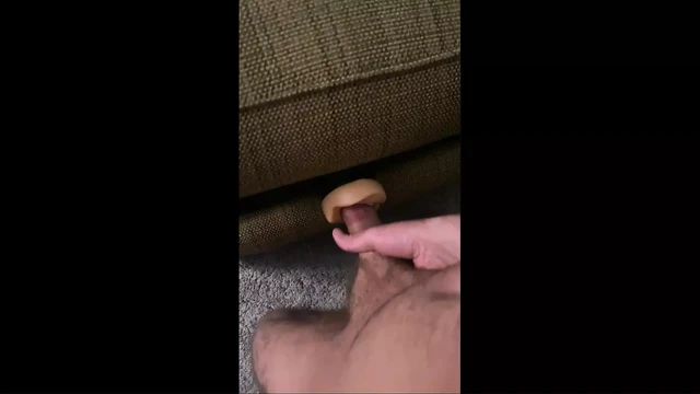 Fucking the Fleshlight in Between the Couch Cushions, Jeffrey Jaxxon Prepares for Yet Another Cum Bath