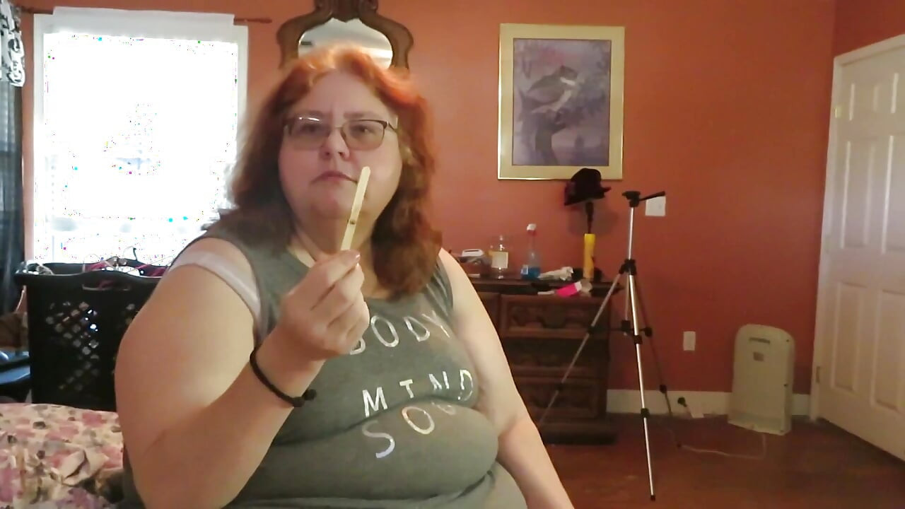 BBW nurse Vicki enjoys eatting a chocolate vanilla ice cream popsiscle