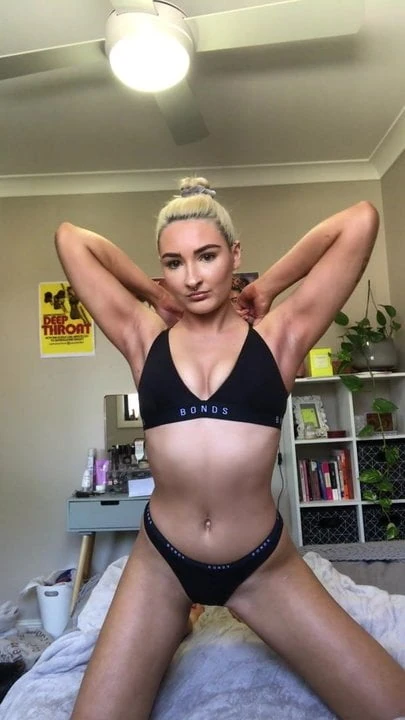 Blonde Taking off Her Top