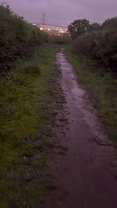 Left clothes in car for a barefoot naked walk in the rain down a lane never walked even clothed