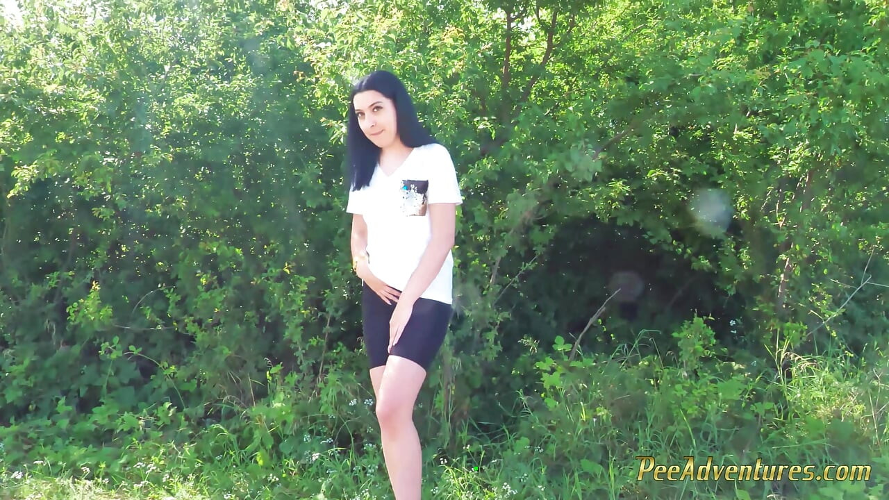 Sexy Brunette Trying Hard to Empty Her Bladder Outside, Then Quick Pee Next to a House in Construction