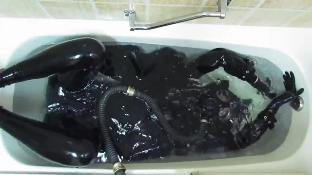 Rubber girl in the bath