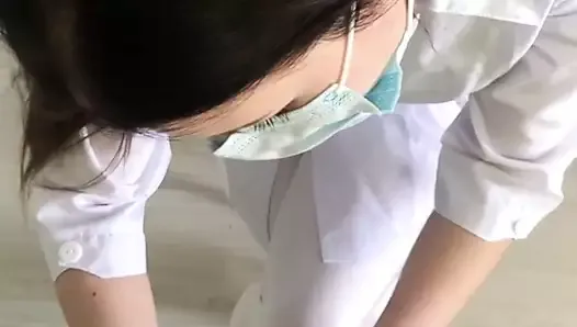 Female doctor examines penis