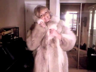 Sexy Woman showing off her Wolf Fur Coat II