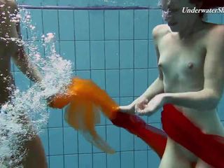 Two redheads swimming SUPER HOT!!!