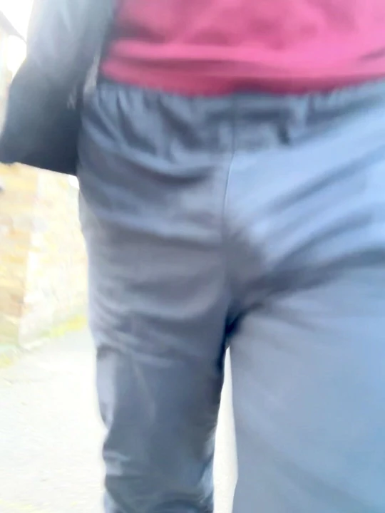 Walking in park with my Cock bulging out. Showing my cock printed on my sweat pants.
