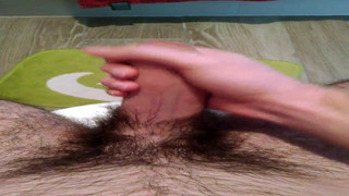 Jerking off hairy cock to climax