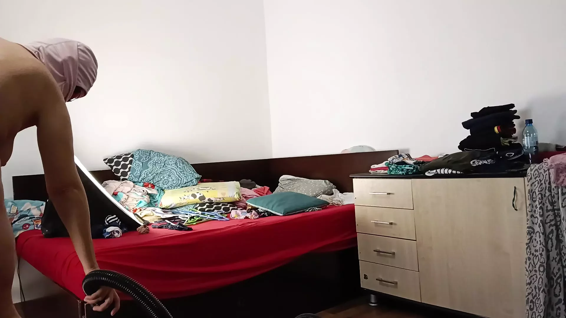 Amateur wife vacuuming in the bedroom. Amateur wife gives me a handjob until I cum.