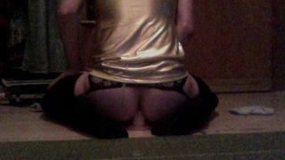 Riding dildo in gold mini dress 2