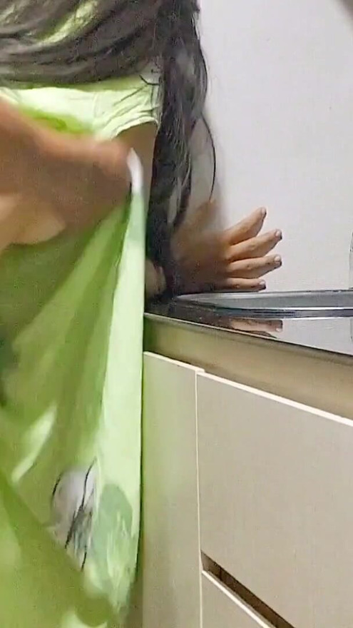 A woman in the kitchen can't wait to get to know each other and enjoy each other's company. | Clip 1