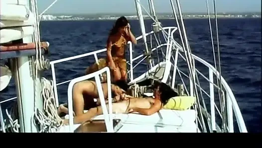 Hot threesome in a boat for two young sluts sucking the cock of the owner