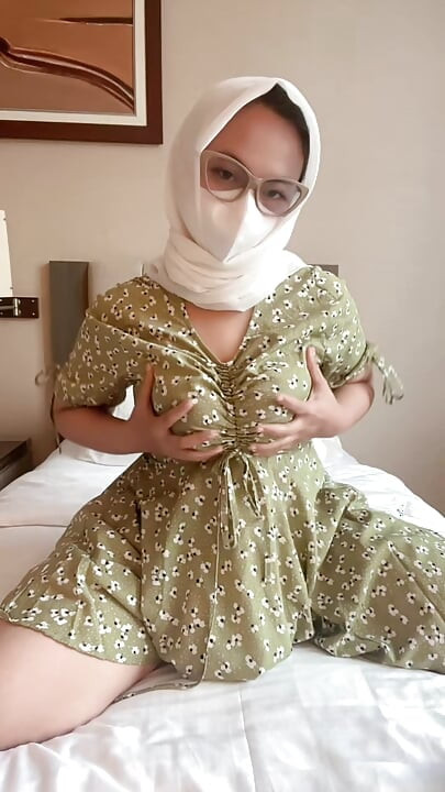 My green daisies girl masturbating with a dildo on the bed