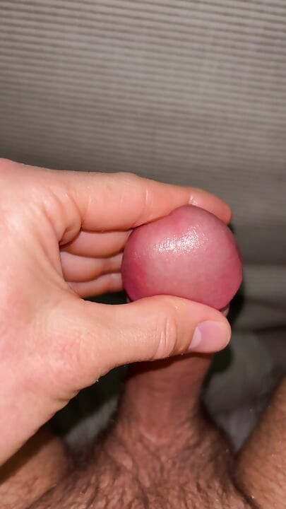 Playing with dick in bed