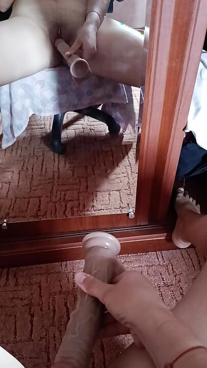 Alone at home in front of the mirror, POV masturbation with a dildo