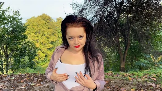 Horny Mistress Lara touches her big boobs in the public park