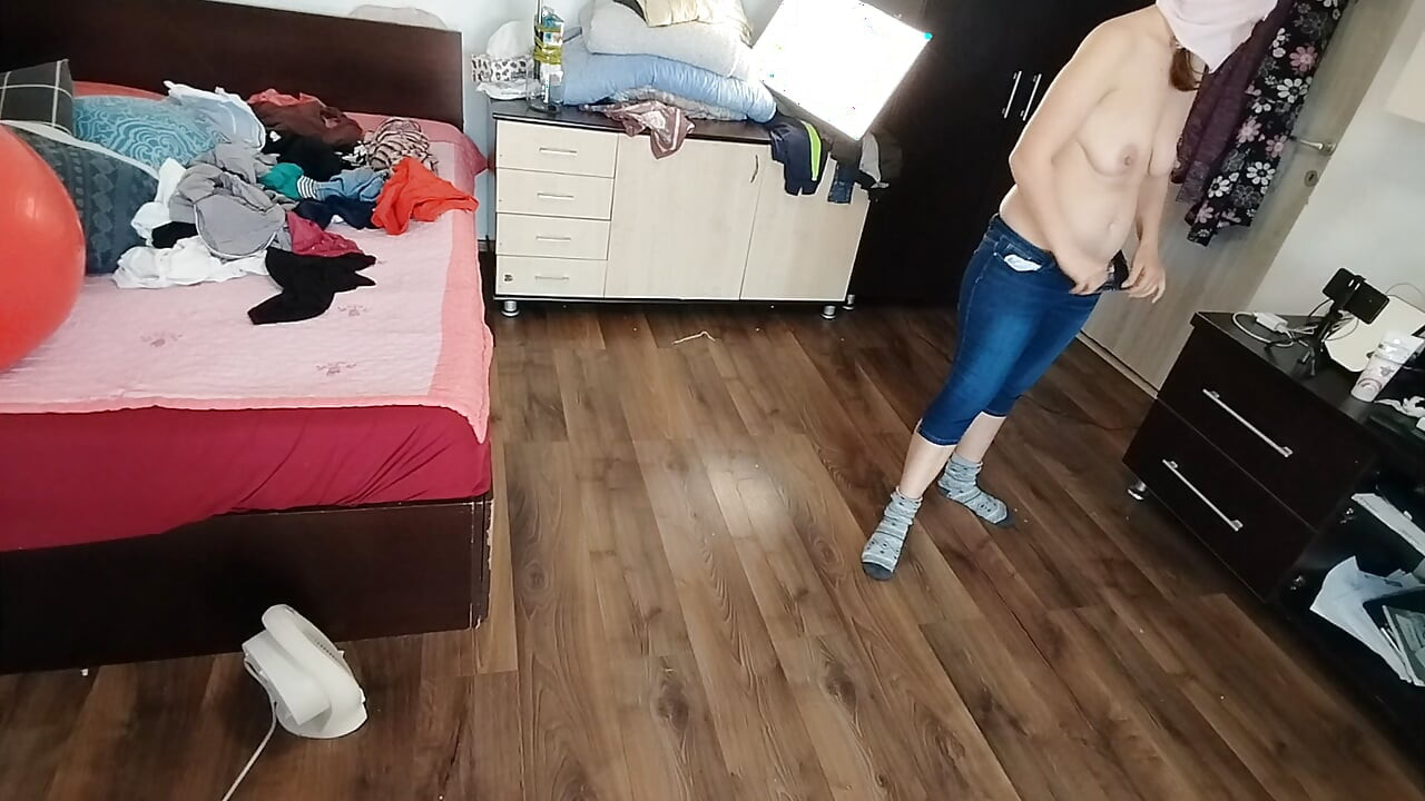 Amateur wife enjoys trying on clothes and cutting them.