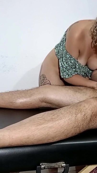 Captivating moment from "He managed to take off the masseuse's clothes and convince her to give him a blowjob and sit on him."