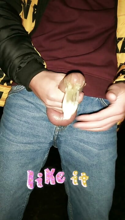 Twink Fills Cum Filled Condom Even More
