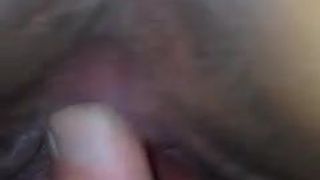 Fingering a very pink and wet pussy