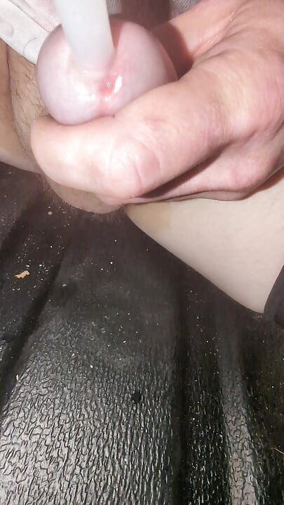 Cum in plastic tube and let It all drip out
