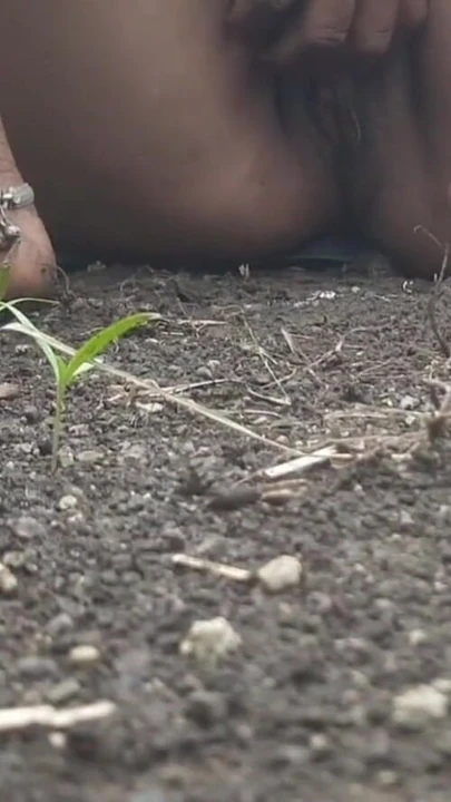 Powerful moment from "In the outdoor open field, my sister-in-law is urinating with fingers in her pussy, showing her"