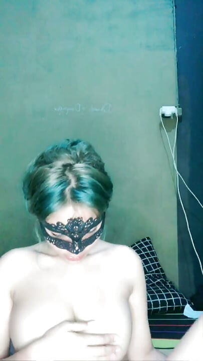 Beautiful girl masked big masturbates until squirt