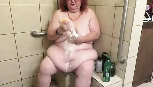 Step mom cleaning bathroom thinks of her step son watching