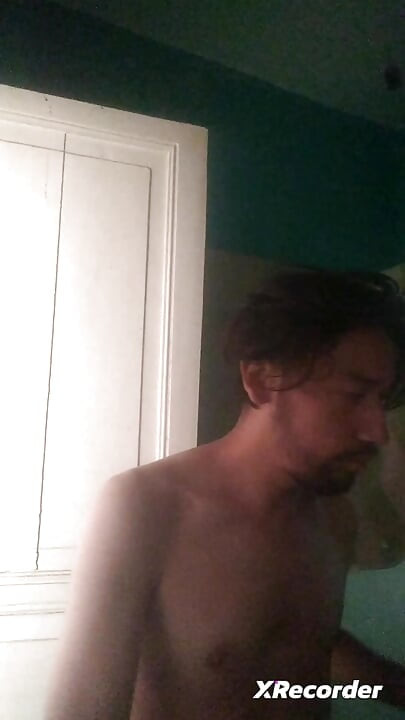 Man does his skincare in the morning