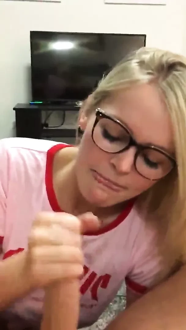 Sexy blond with glasses sucks cock and eats cum