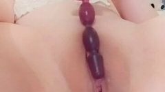 sliding anal beads into my cute innie pussy