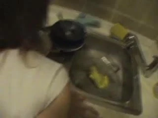 Her orgasm in the kitchen