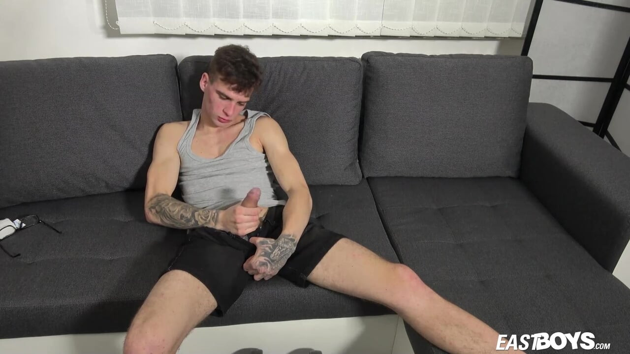 Hot slim boy with abs shows his cock